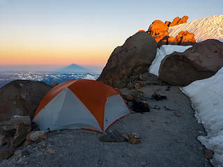 Camp with Glacier Peak's shadow
