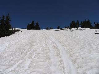 Snow slopes leading up to the ridge above Rock Lake
