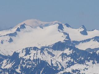 View from the summit: Mount Rainier "peaking" out behind Mt Daniel.