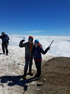 My son and I on Mt Baker with Shuksan peaking through the clouds