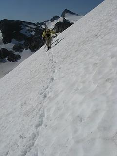 Steve traverses some steep snow