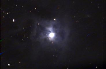 A hot bright new star illuminates the nebula that gave birth to it