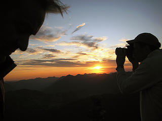 Mt. Rainier picture taker with sunset and silhouette
