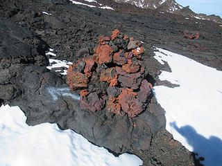 red lava cairn