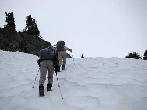The final climb to the col was up this steep snow section. Our micro spikes proved handy for this section.