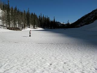 Mike checking the frozen surface of No Dice Lake