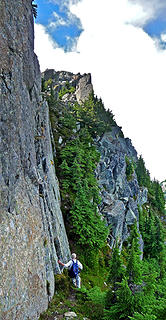 Immediately after going through the notch on the ridge, the route skirts the base of this vertical rock tower. What's not visible is the huge exposure down the north face to the right.