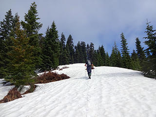 Nearing the top of the ridge on firm snow.