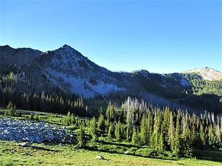 Looking back on our camp from the high route to Oval Lakes. Chelan summit trail in valley on right