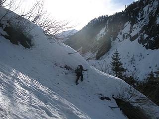 Charming icy gully crossing on the eternal traverse