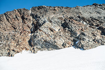 summit left of the white stripe