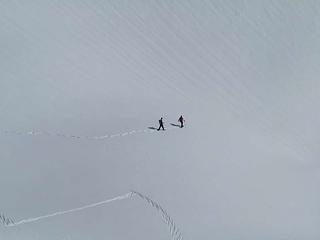 Snowshoers heading to the southeast end of Lake Ann