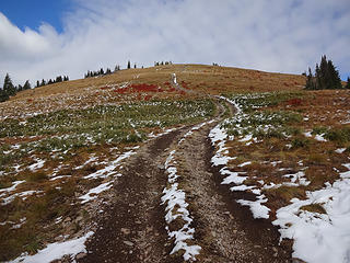 An ATV track heads to the summit.