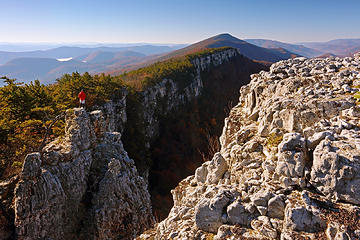 8- Me, atop one of the spires at Chimney Top. I had this picture in mind from even before my hike up to Chimney Top, based on past trips. I needed someone else to take it for me though, since the spire Im standing on was a 2-min scramble away from the spot the camera was sited. Thankfully, this other hiker showed up and agreed to take the picture. I set up the shot and mounted the camera on the tripod so that he would just have to push the shutter release button, and then raced over to my perch.