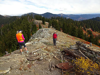 Inspecting ruins of Goat (Grassy) Ridge Lookout on the highpoint of Goat Ridge, 6372.'