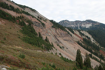 wall rock of the caldera, with dikes and even some intra- caldera collapse breccia blocks. Hannegan Peak upper left.