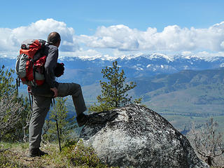 Steve looking across the Methow Valley at the Sawtooths from End Mountain to Reynolds, to Gardner Ridge.