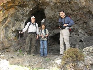 Tony, David, and Steve checking out some small caves in a rock formation