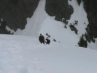 Waiting for climbers from the groups in front of us to climb down the steep slope into the notch.