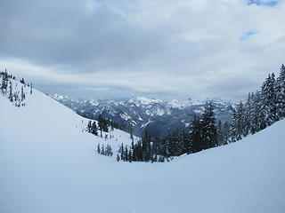 getting into open terrain on Silver with Snoqualmie area peaks behind