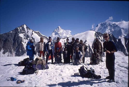 K2 from Gondogoro Pass with our Balti porter crew (lead guide third from the left) and one of the trekkers