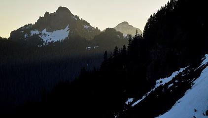 Forgotten Peak and Mt Pugh seen from the trail.  First light gleaming through the Perry Creek Valley.