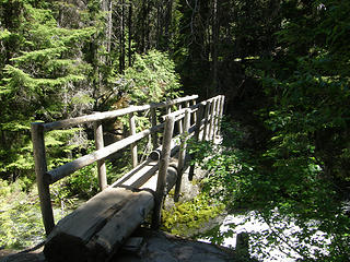 Log bridge crossing of Mountaineer creek.