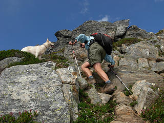 BadDog and Holly ascend a steep cliffband section of Portal Peak