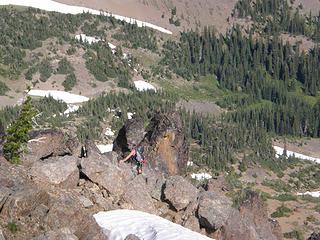 Climber coming up from somewhere in valley containing Buckhorn Lake.