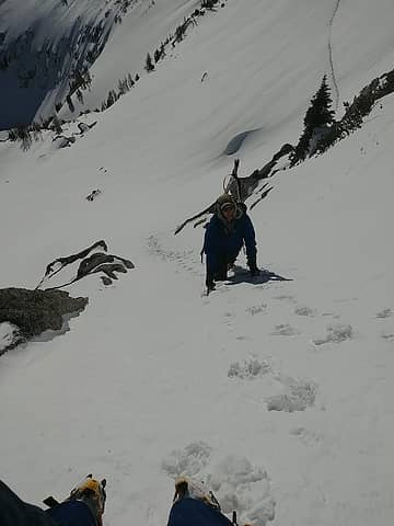 climbing up the steep gully below the summit