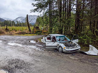 Trashed car at the Sunday Lake trailhead