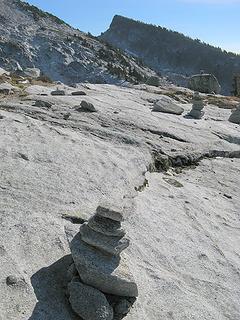 Granite slabs infested with many cairns