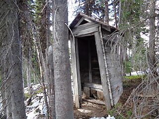The outhouse is still standing.
