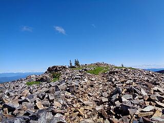 Abercrombie Mtn summit, 7308.' This ranks as the 7th most prominent summit in the state after the volcanos and Mt Stuart.