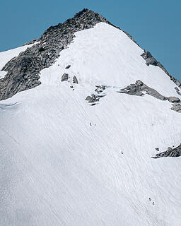 Climbers on Vesper's summit block