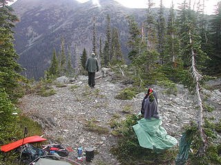 Rod at our high traverse camp, trying to dry out in the morning before departing