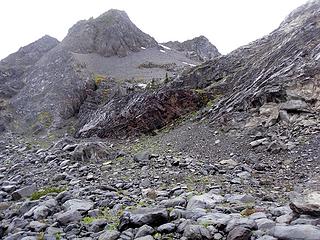 This is the tricky move to get to the upper camp. Rod found a way to the elft; I came over those rocks in the center and nearlyt fell thirty feet. Sketchy