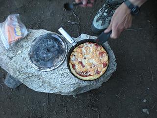 shrimp pizza in the Banks fry-bake pan in the Trinity Alps of northern California. At a camp while backpacking near the PCT. Sauce was from powdered tomato sauce.