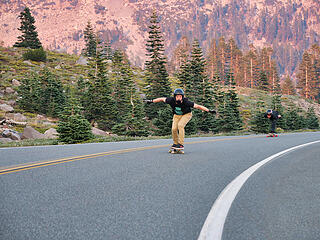 Long boarders on the ski lift road