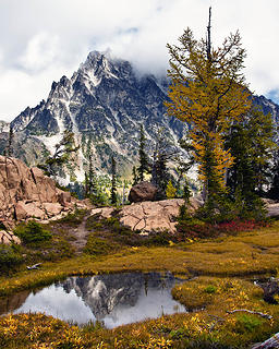 Mount Stuart reflected in Headlight Basin Tarn with Fall Colors