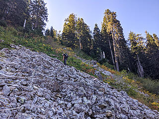 Nearing the top of the talus field after 400' elevation gain from the bottom. Our route went left before the very end to catch a steep part of the ridge leading up 200' to a the narrowest ridge on the whole trip -- kind of like a rooster comb.