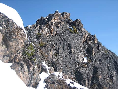looking back up at the bare side of the summit block