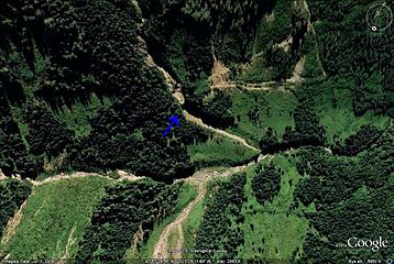 Molybdenum Falls, in the shadow where the arrow's pointing. - (inverted Google Earth screen capture)