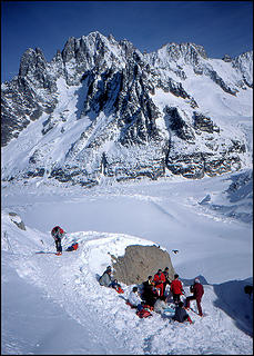 Skiers prepare for the descent from L'Aiguille du Midi down La Vallee Blanche on Mont Blanc, February 1986. Nikon F2, Nikkor 20mm f4, Kodachrome 64.