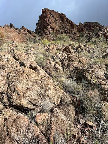 Stay south of the pinnacle at center (obscured here) and hug the north wall of the rock outcrop