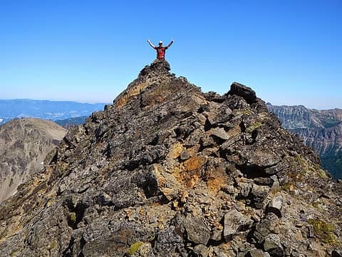 triumphant on the wrong summit