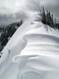 Looking up the cornices to the next high point