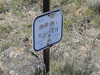 Boundary marker Trail along fence towards high point on Yakima Skyline ridge.
