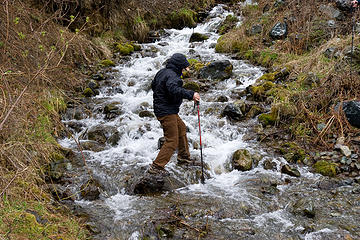 Hikers try to keep there feet dry while crossing McCrea Creek, West Fork Rapid River Trail, Idaho.