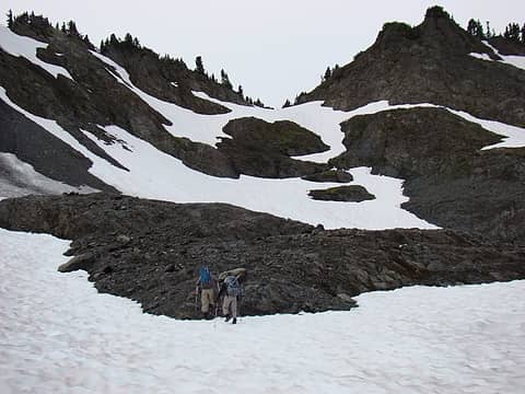 We climbed through mixed rock and snow towards the col. This would lead us to the Fire Creek drainage and our route home.